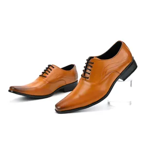Classic brown men's dress shoes with laser-cut perforations and stylish black laces