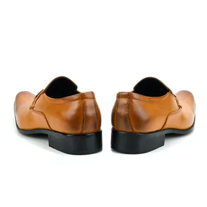 Rear view of brown leather men's business loafers showing heel and stitching detail