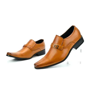 Detailed side view of tan leather business loafers for men featuring a decorative buckle