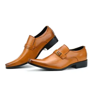 Side view of classic brown leather men's dress shoes with buckle detail