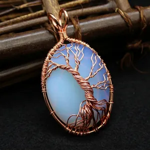 Rose gold wire wrapped oval tree of life pendant necklace in handcrafted ethnic style