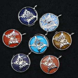 Set of seven circular crystal pendants featuring silver butterfly filigree overlays