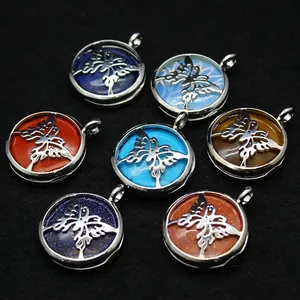 Collection of seven natural crystal butterfly pendants in vibrant colors for DIY necklaces