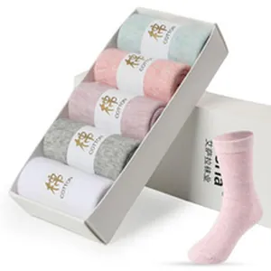 Close-up of 5 pairs of colorful cotton socks in a gift box, including pink, blue, and grey.
