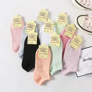 A variety of colorful low-cut women's cotton liner socks with original Japanese tags