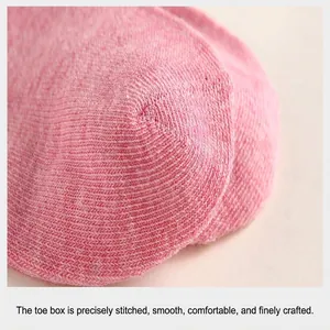 Close-up of precision stitched toe seam on soft pink cotton low cut invisible sock