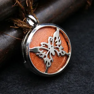 Elegant silver butterfly pendant necklace with sparkling red sandstone crystal detail