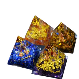 Handcrafted resin Tree of Life ornaments with assorted crushed crystal stones in pyramids