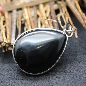Minimalist black obsidian teardrop pendant necklace with silver-tone metal frame