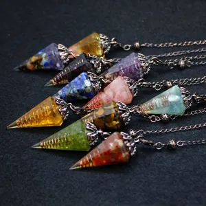 Vintage hexagonal cone crystal pendulum pendants with various gemstones and copper wire.