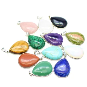 Assorted teardrop-shaped natural stone pendants with silver metal bails for jewelry