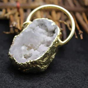 Natural irregular white crystal agate geode pendant with elegant gold plated rim and bail