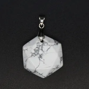 Detailed macro view of hexagonal faceted white stone pendant with natural grey veins