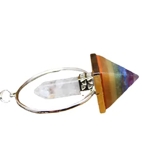 Healing seven chakra natural stone pyramid pendulum pendant with clear hexagonal crystal.