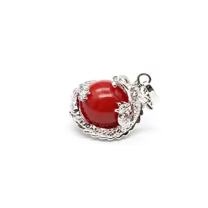 Vintage ketting met Chinese draak hanger en een rode rhodochrosiet stenen bol