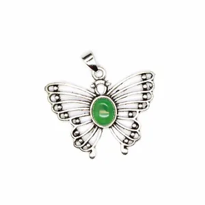 Vintage butterfly pendant with natural green malachite stone in hollow silver frame