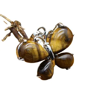 Detailed natural tiger eye stone butterfly pendant with elegant silver finish