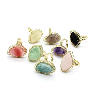 Detailed view of medieval retro gold wire-wrapped rings with various raw crystals
