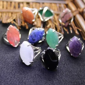 Assorted set of minimalist adjustable oval gemstone rings featuring various colorful crystals