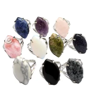 Collection of adjustable rings with marquise-shaped natural stones in various colors