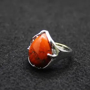 Oversized teardrop red stone adjustable statement ring with silver metal setting