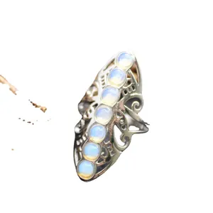Bohemian silver adjustable statement ring with seven round milky opalite stones