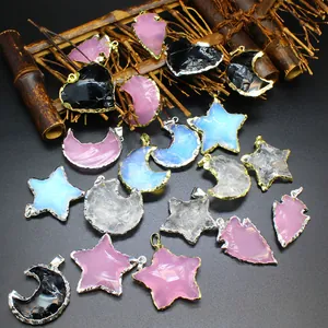 Selection of star and moon opal pendants with gold and silver plated edges