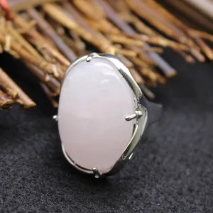 Exaggerated large oval pink quartz stone ring with adjustable silver-colored metal band