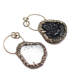 Colgantes étnicos de Buda Maitreya tallados en obsidiana y cristal blanco para collares.