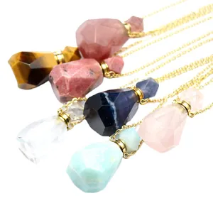 Set of various colorful faceted gemstone perfume bottle pendants on gold chains