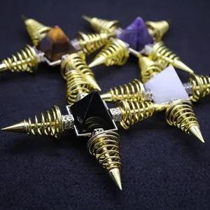 Unique pyramid crystal ornaments featuring gold spiral bases in various gemstone colors