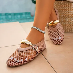 Chic pink fishnet mesh hollow-out flat sandals with elegant gold buckle accent