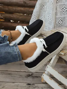 Women's warm winter snow boots featuring white faux fur lining and white lace-up detail