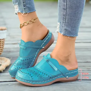Stylish blue retro platform mules with 4.5cm heel height and laser-cut star patterns
