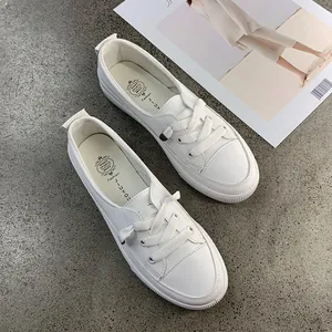 High-quality detailed view of women's white casual sneakers with JIUYOU fashion branding