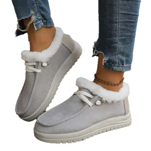 Cozy grey winter snow boots with white faux fur lining and lace-up design