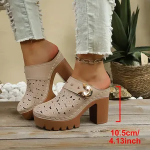 Side view detail of beige hollow-out chunky heel mules with a 10.5cm heel height.