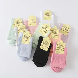 Assorted set of soft candy-colored solid cotton crew socks for women in pastel tones