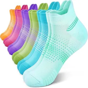 Detailed view of colorful moisture-wicking ankle socks for men with breathable mesh