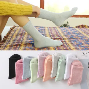 Soft candy colored cotton crew socks for women available in various solid tones