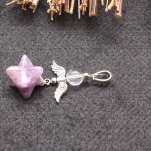 Purple amethyst merkaba star pendant with silver angel wings on grey background
