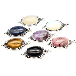 Antique silver-plated pendants set with natural gemstones like amethyst and opal stones