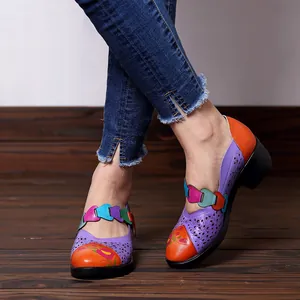 Detail view of retro macaron Mary Jane shoes with floral print and hollow-out design.