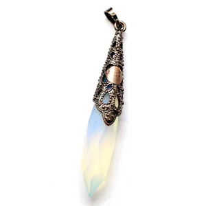 Vintage crystal point bullet pendant necklace with ornate metallic filigree cap.