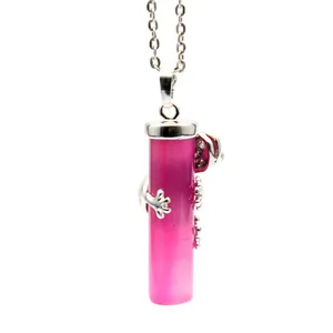Fashionable chameleon pendant necklace with watermelon red crystal pillar on silver chain.
