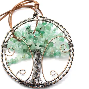 Vintage Tree of Life hanging ornament with green crystal stones and copper wire wrapping.