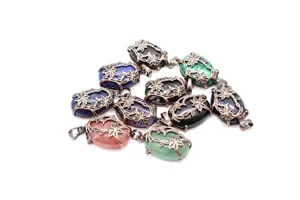 Detailed view of vintage medieval double flower pendants with varied stones