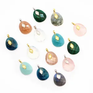 Collection of colorful teardrop natural stone pendants with gold-plated diamond accents.