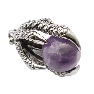 Retro medieval dragon claw pendant necklace with purple round bead gemstone accent.