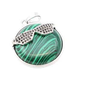Green malachite-style round pendant with black stone sunglasses charm detail.